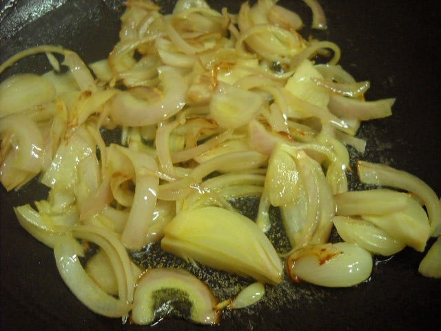 frying sliced onions till light brown. 