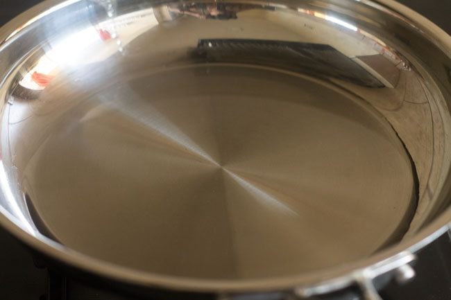 heating oil in a steel skillet