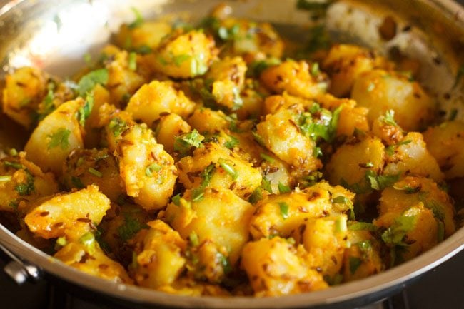 coriander leaves mixed with the jeera aloo