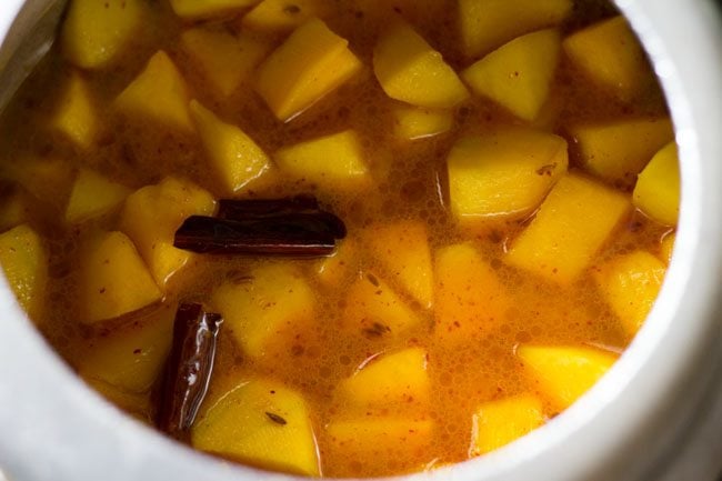 mixing water with pumpkin and spices