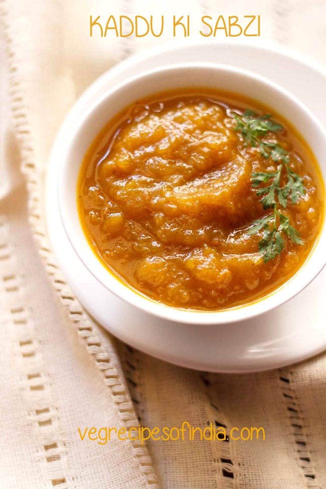 kaddu ki sabzi served on a white bowl placed on a white tray