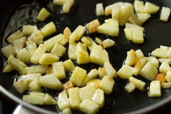 frying potatoes till light brown. 