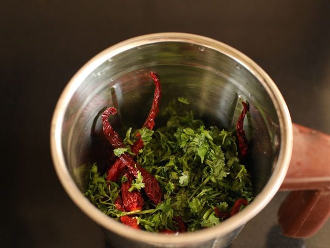 coriander and soaked chiles in a grinder.