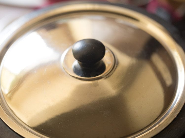 cover the pan with a lid and cook