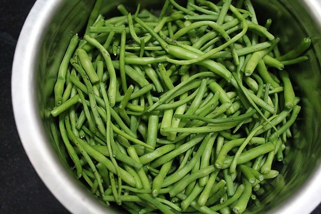 rinsed and chopped radish pods in a bowl for moongre recipe. 