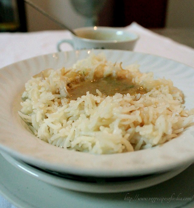 veg dhansak served on a bed of brown rice. 