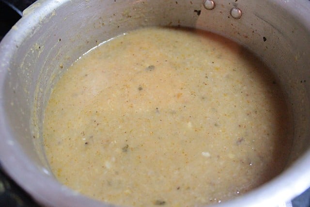 mashed and strained lentils-vegetable mixture added to the cooker. 