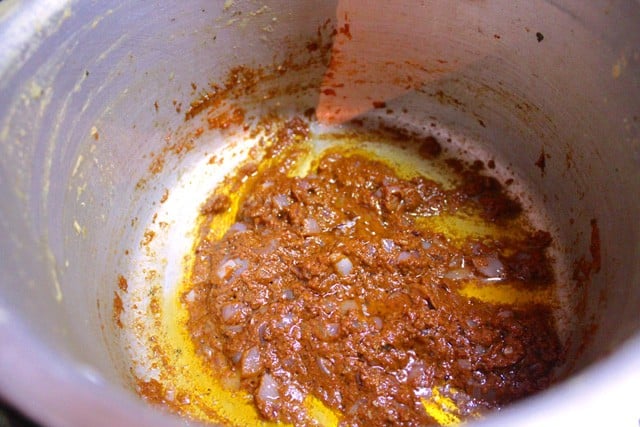 prepared dhansak masala paste added to the pressure cooker. 