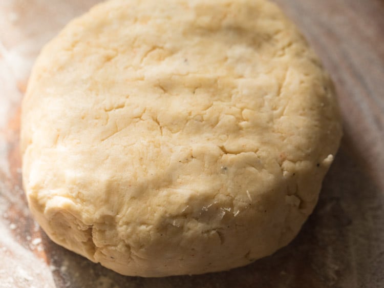 cheese biscuits dough on a rolling board