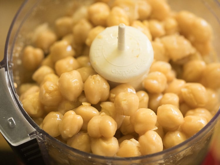 cooked chickpeas added to jar with  paste