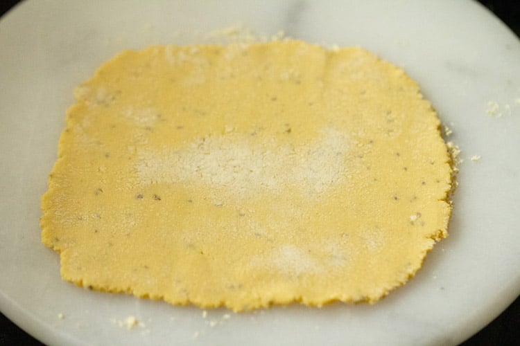 rolled maize flour flatbread on white marble board