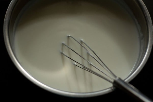 whisking curd