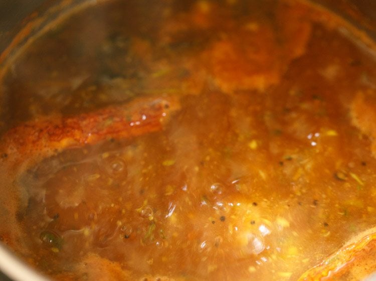 thakkali rasam simmering