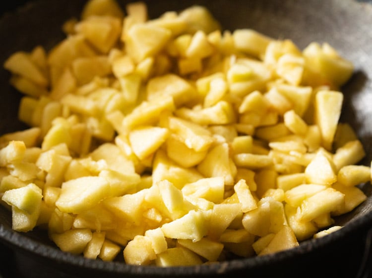 chopped apples added to ghee