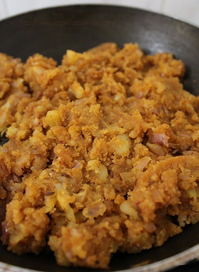 cooking potato mixture in the pan. 