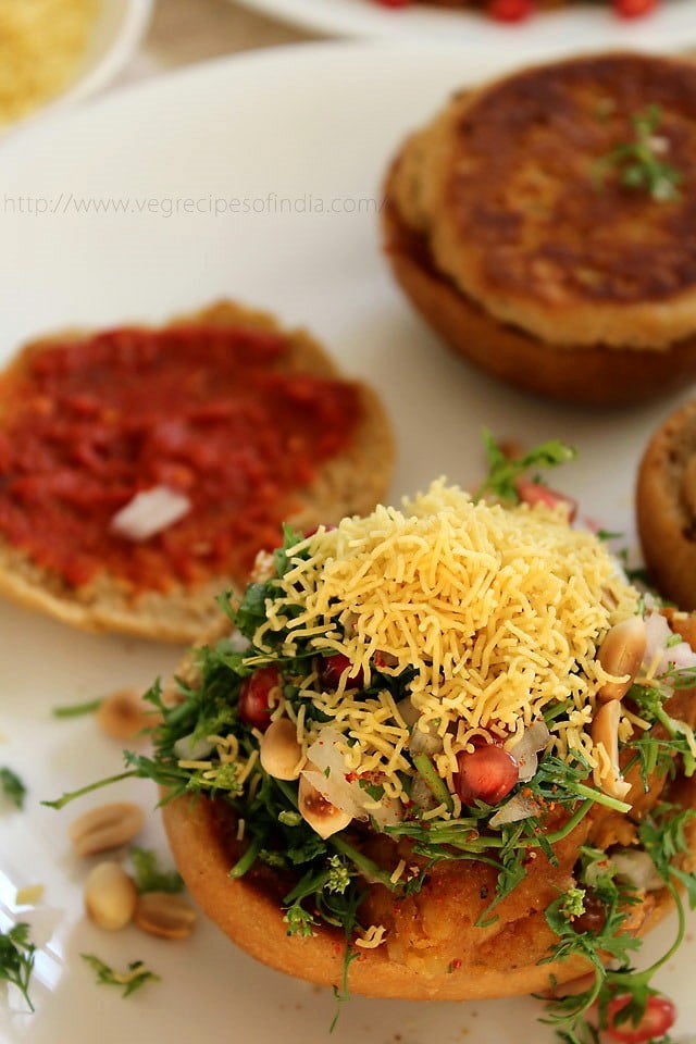 potato filling bun half finally topped with sev. 