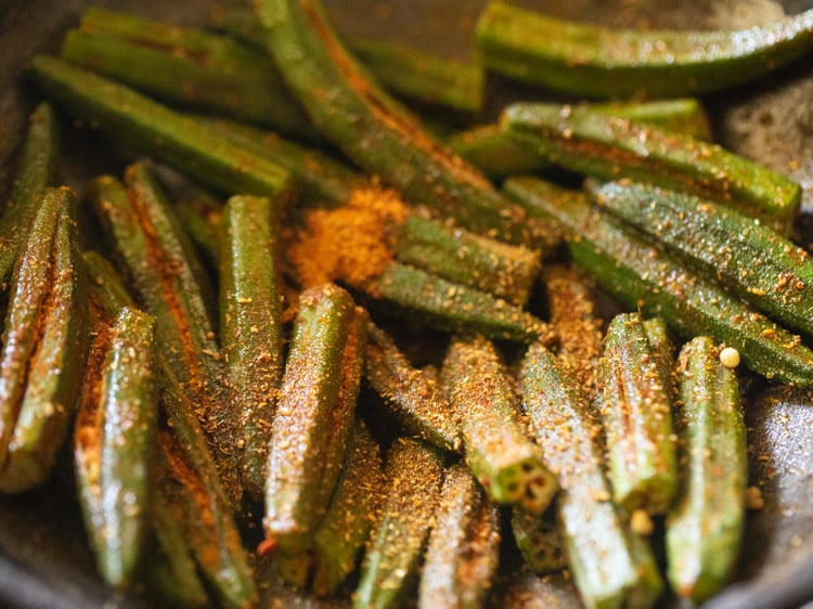 adding leftover masala to bharwa bhindi