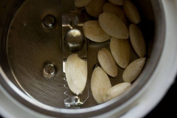 peeled almonds in a jar