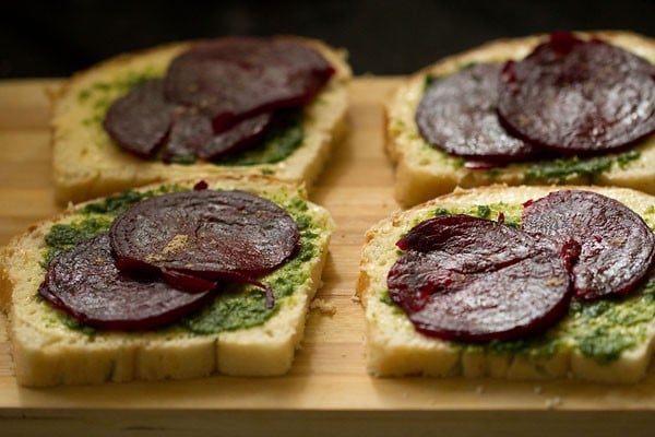 black or regular salt, roasted cumin powder and chaat masala on sandwich slices.