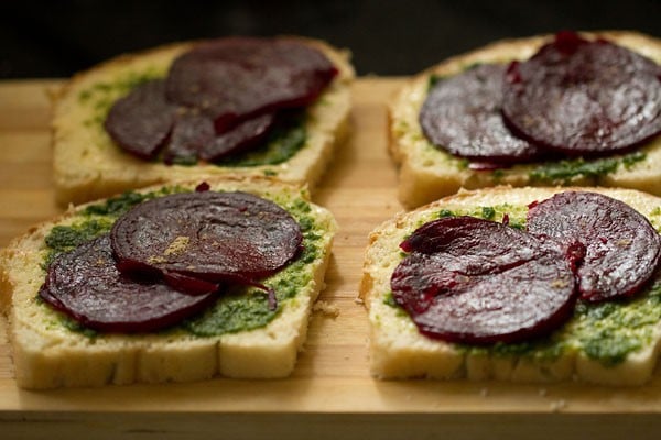 black or regular salt, roasted cumin powder and chaat masala on veg sandwich slices. 