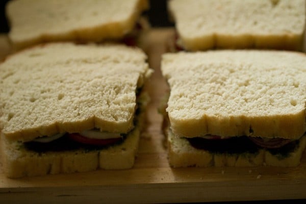 prepared mumbai sandwiches on a board.