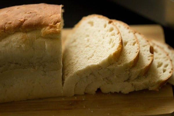 slicing homemade bread.