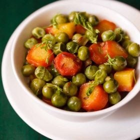 gajar matar ki sabzi served in a white bowl