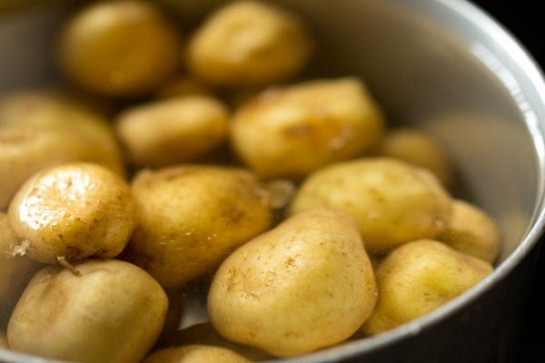baby potatoes added to salted water.