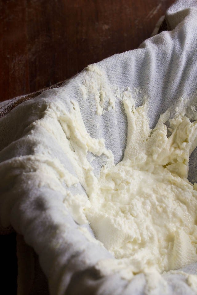 thick curd after hanging in the cheese cloth 
