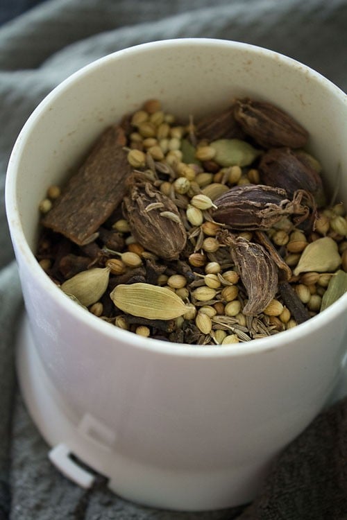 more whole spices added to dry grinder to blend in batches.