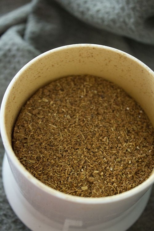 punjabi garam masala ready and ground in a spice grinder.