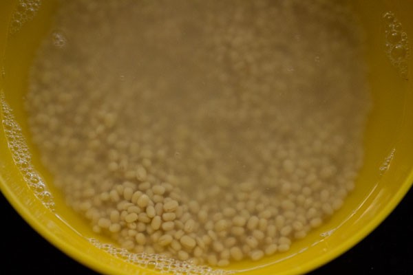 add water to urad dal and soak them