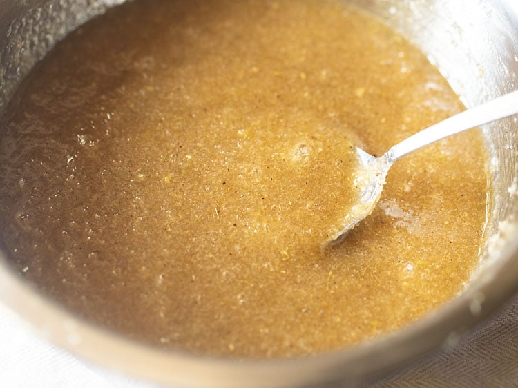 aam panna concentrate looks mostly uniform after stirring.