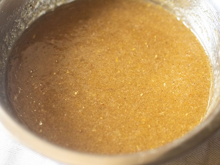 aam panna concentrate in metal bowl.