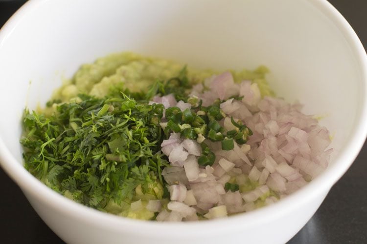 onions coriander leaves and green chili added