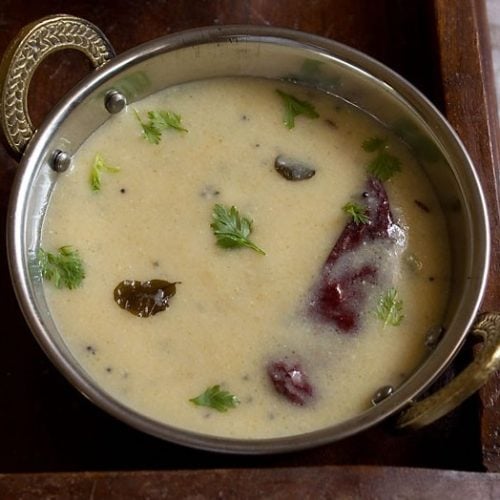 gujarati kadhi served in a brassware.