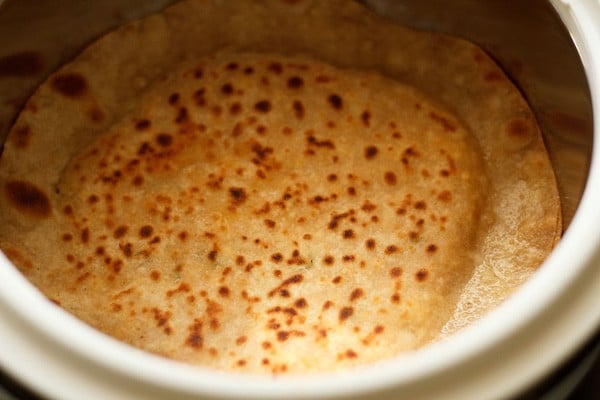 paneer paratha in a roti basket or casserole