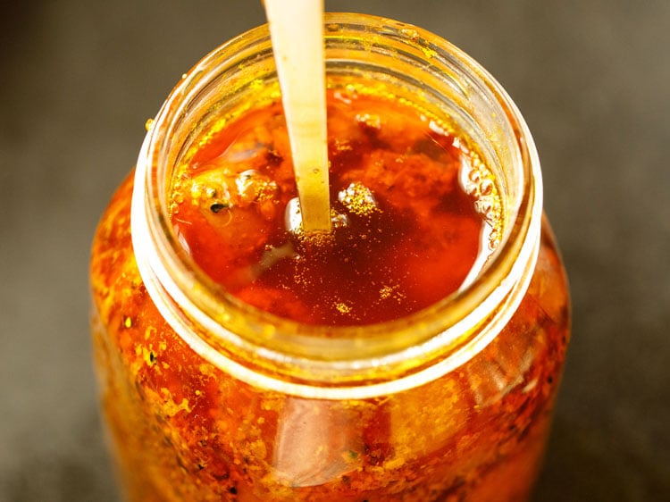 mixing the mango pickle
