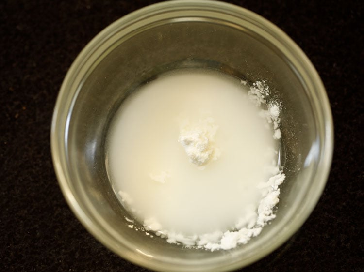 making corn starch slurry in a bowl