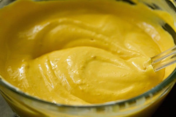 mango ice cream mixture in a bowl
