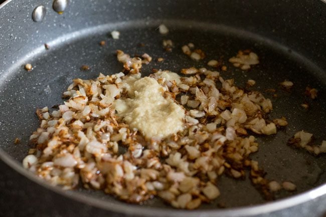 ginger-garlic paste added to pan. 