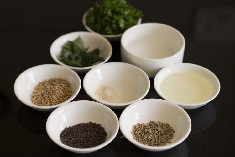 ingredients for tempering in white bowls
