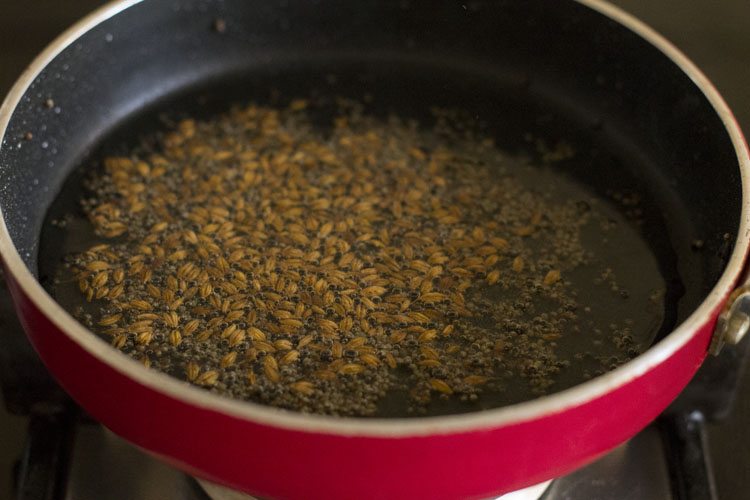 cumin seeds spluttering in oil