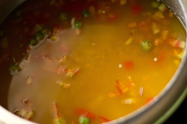 all the ingredients in the pressure cooker have been mixed well