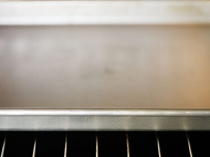 baking tray placed in the oven and getting preheated in the oven