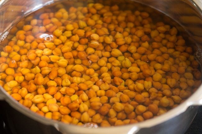 black chickpeas added to pressure cooker along with water