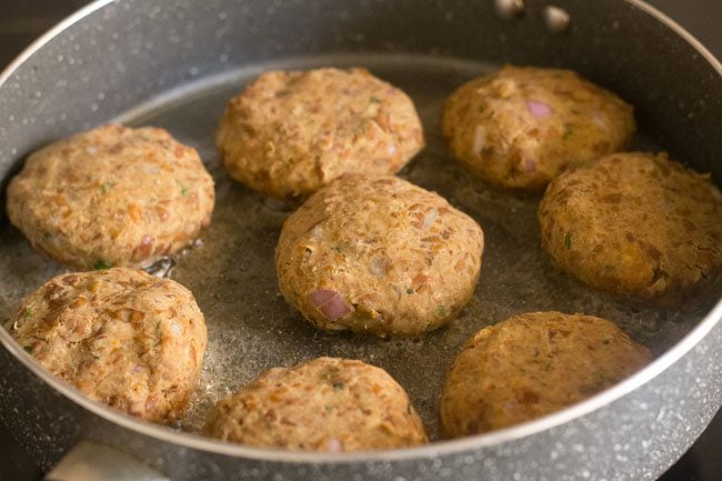 shami kabab placed on pan