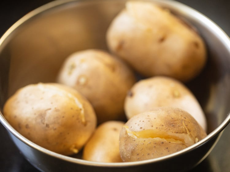 boiled potatoes in a steel bowl