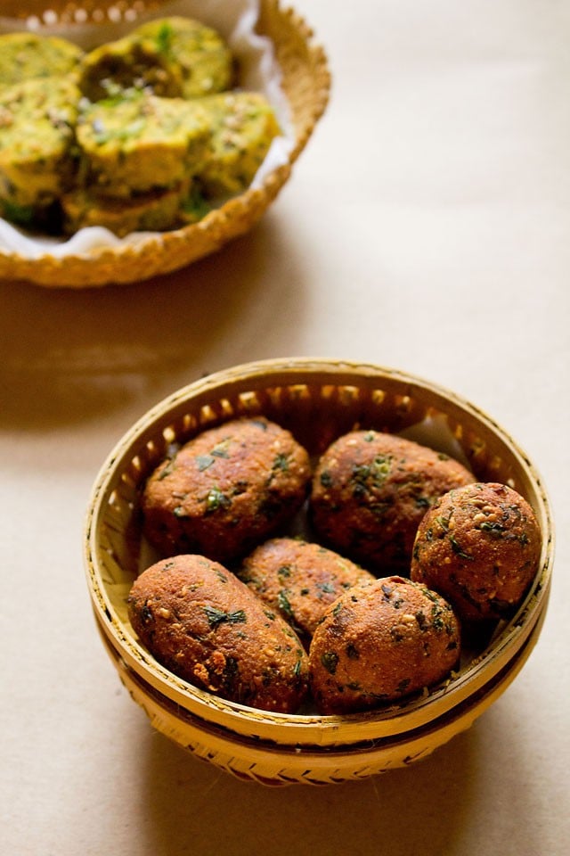 fried methi muthia in a bowl