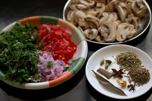 prepped ingredients and spices to make mushroom biryani